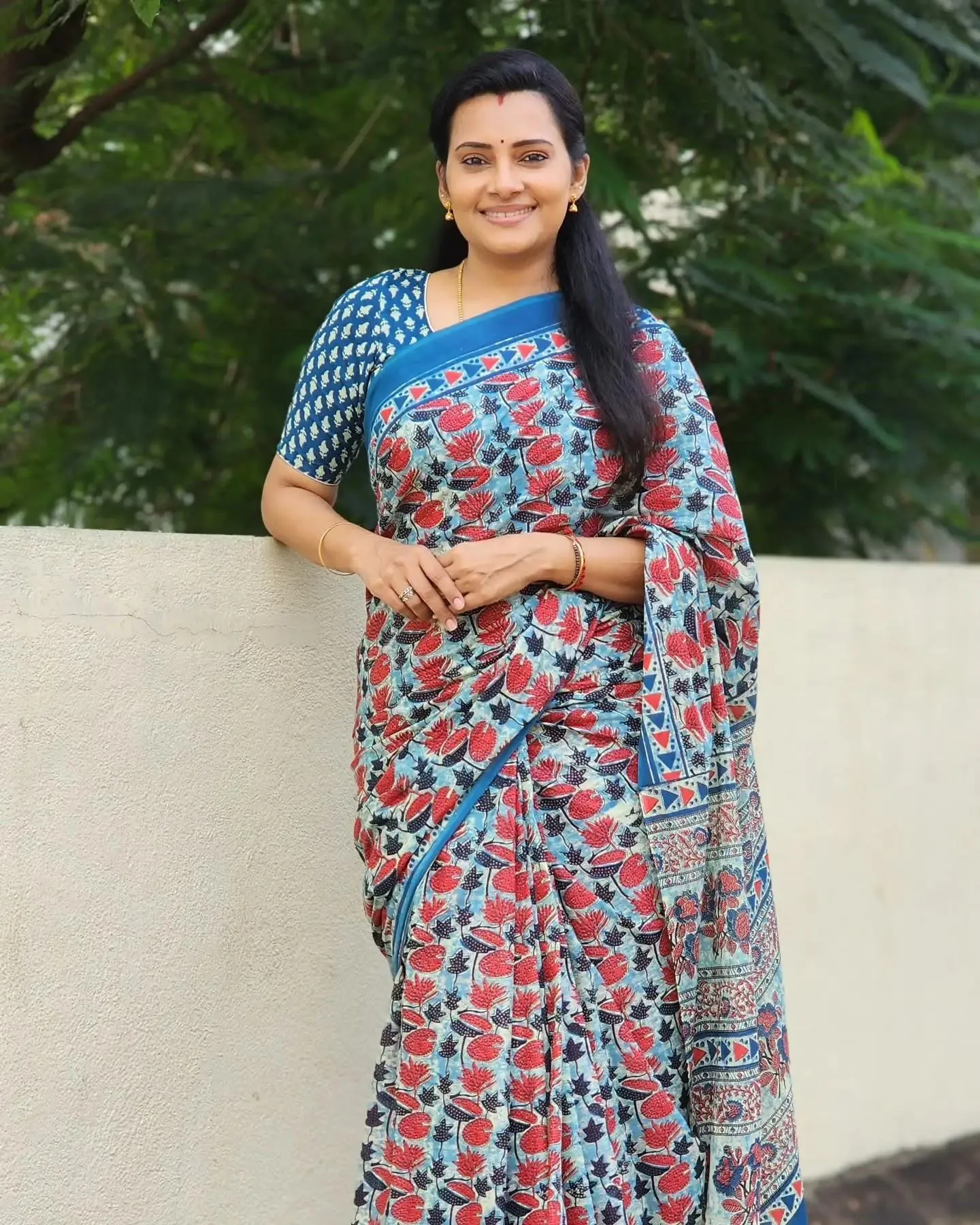Charming Shruthi Raj in Multicolor Saree Standing Outdoors