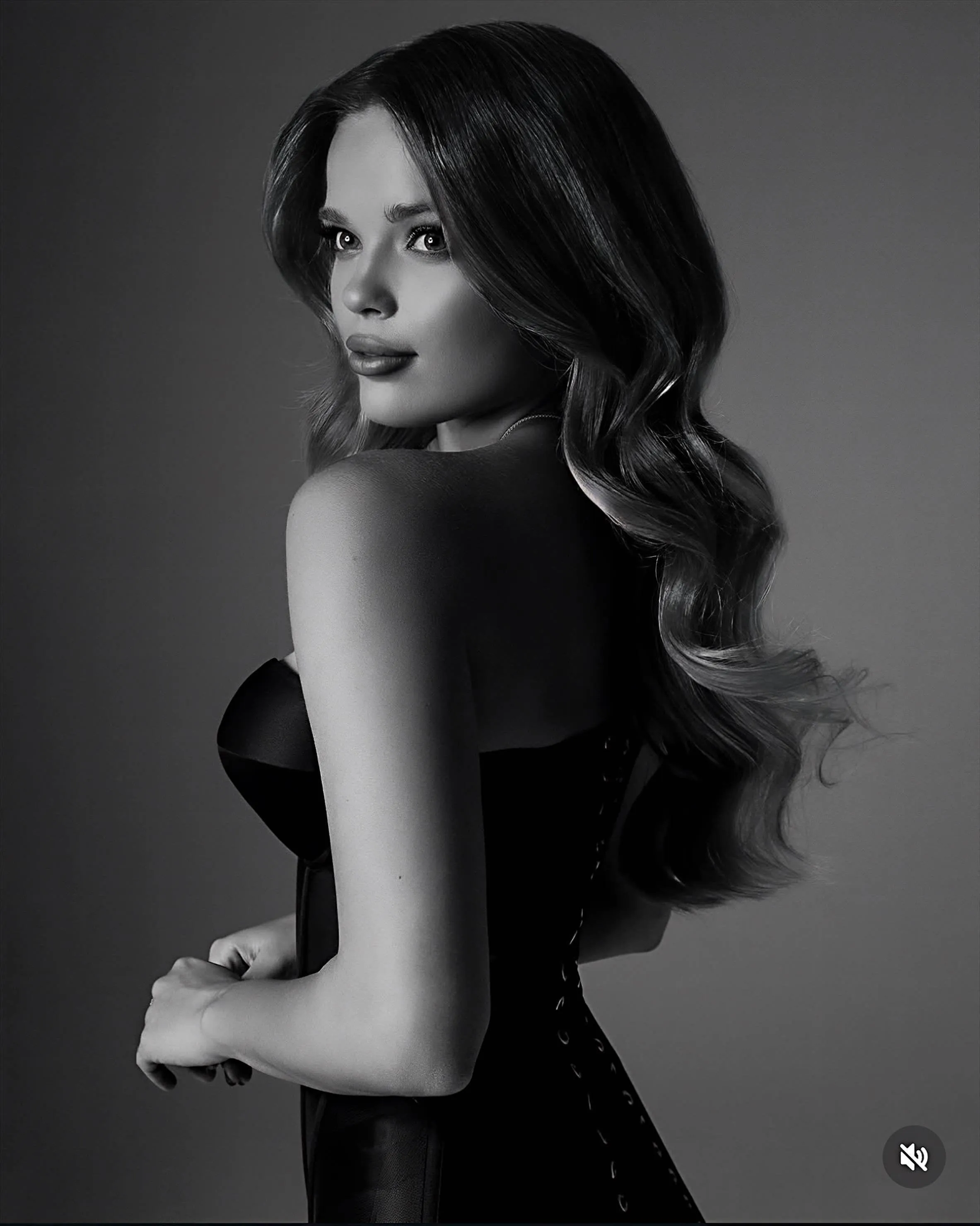 Classic Black and White Portrait of a Woman with Curled Hair