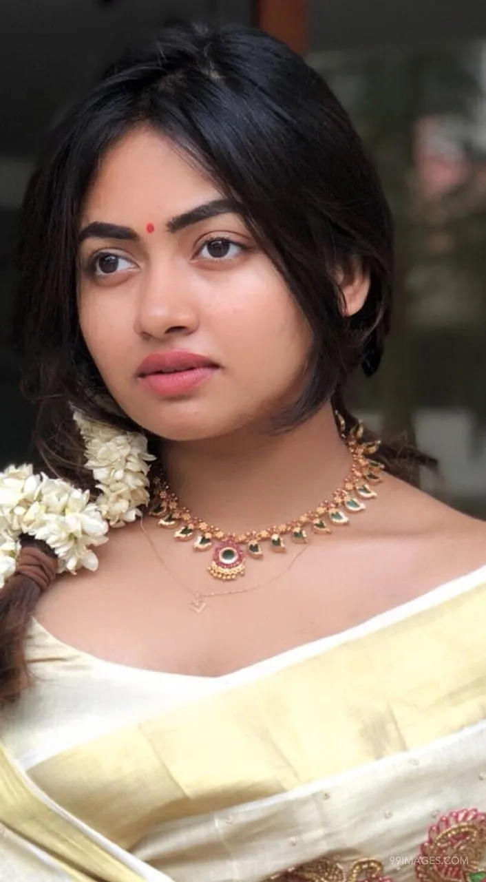Close up of Shaalin Zoya in an Onam saree looking sideways