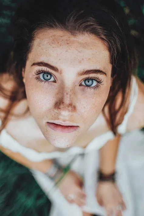 Close Up Portrait of a Blue Eyed Woman with an Intense Stare