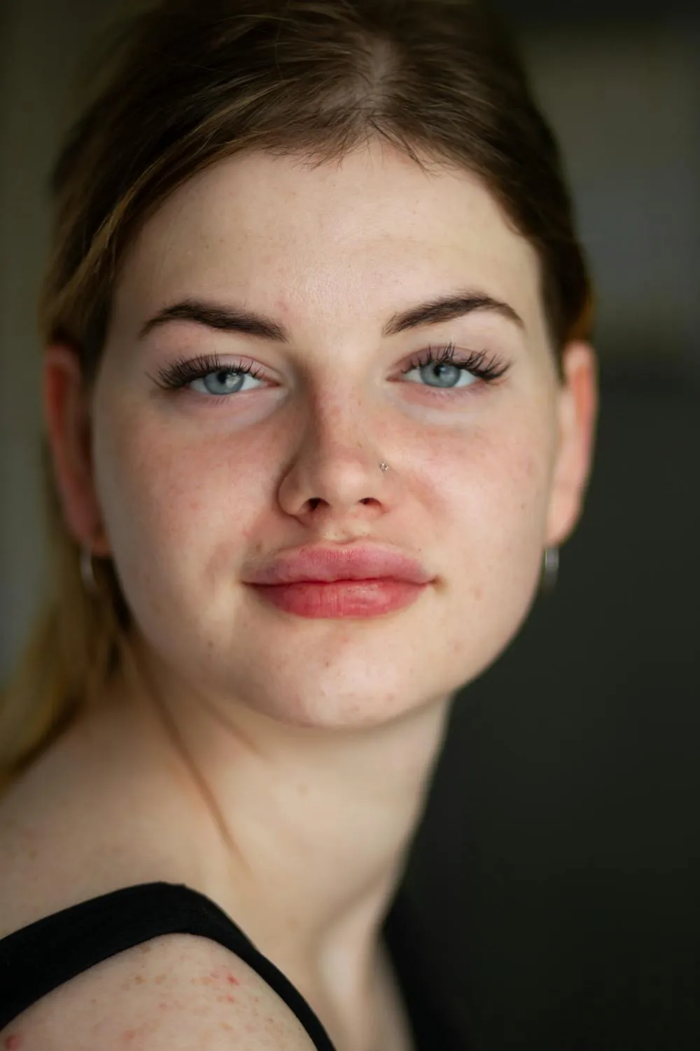 Close Up of a Young Woman Smiling with Soft Natural Lighting