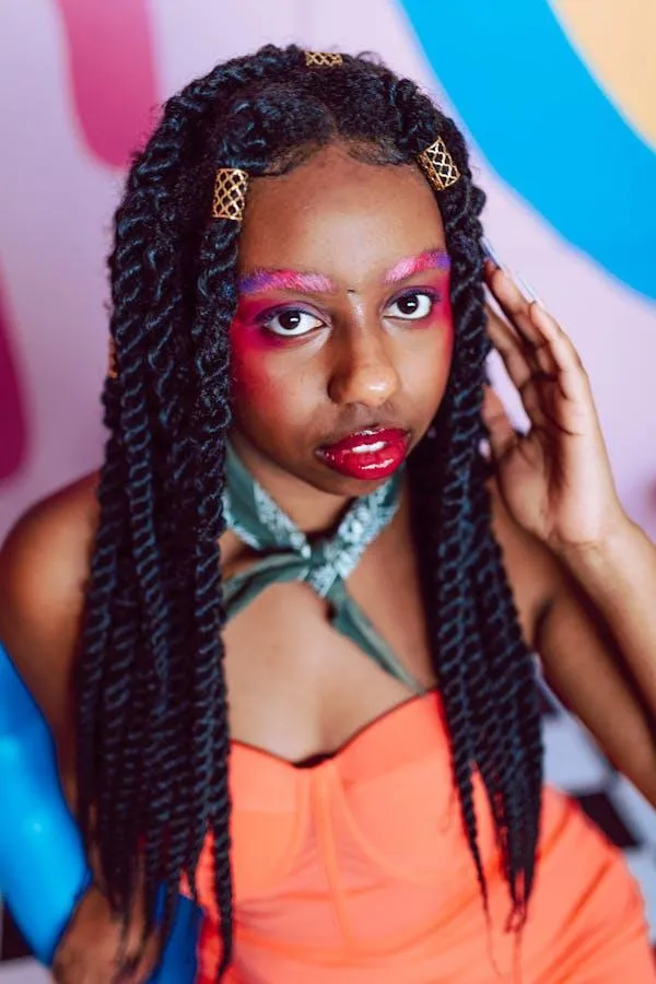 Colorful Portrait of a Woman with Braids and Bold Makeup