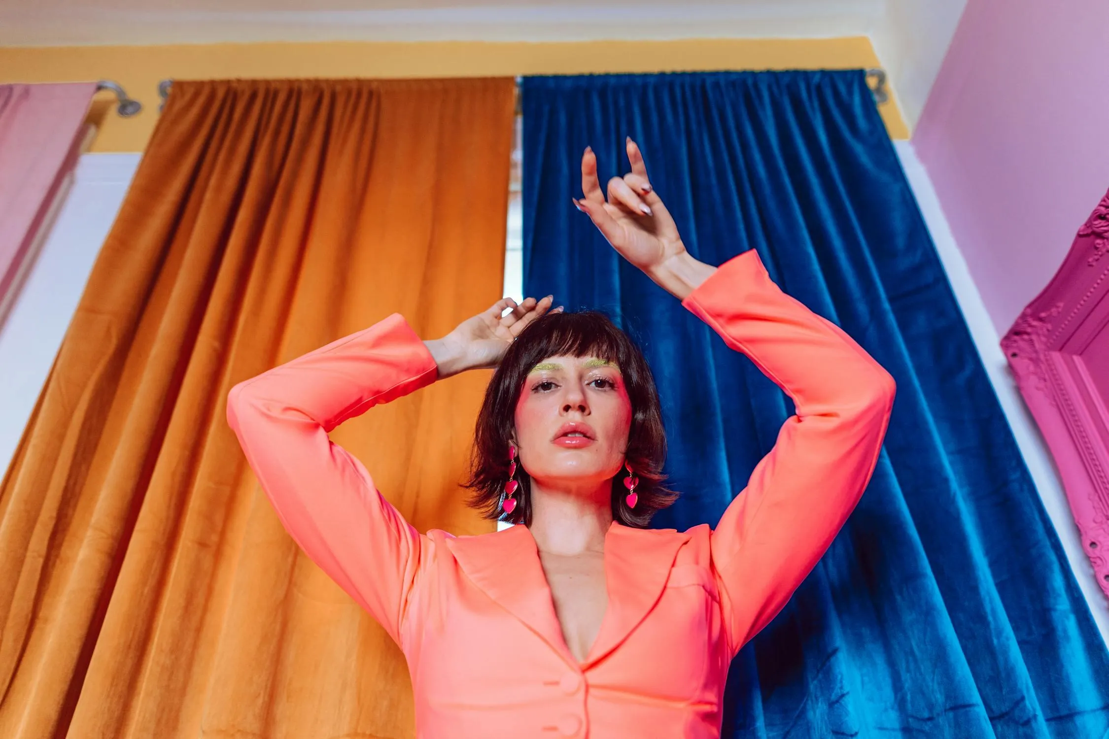 Colorful Portrait of a Woman Dancing in a Bright Bold Room