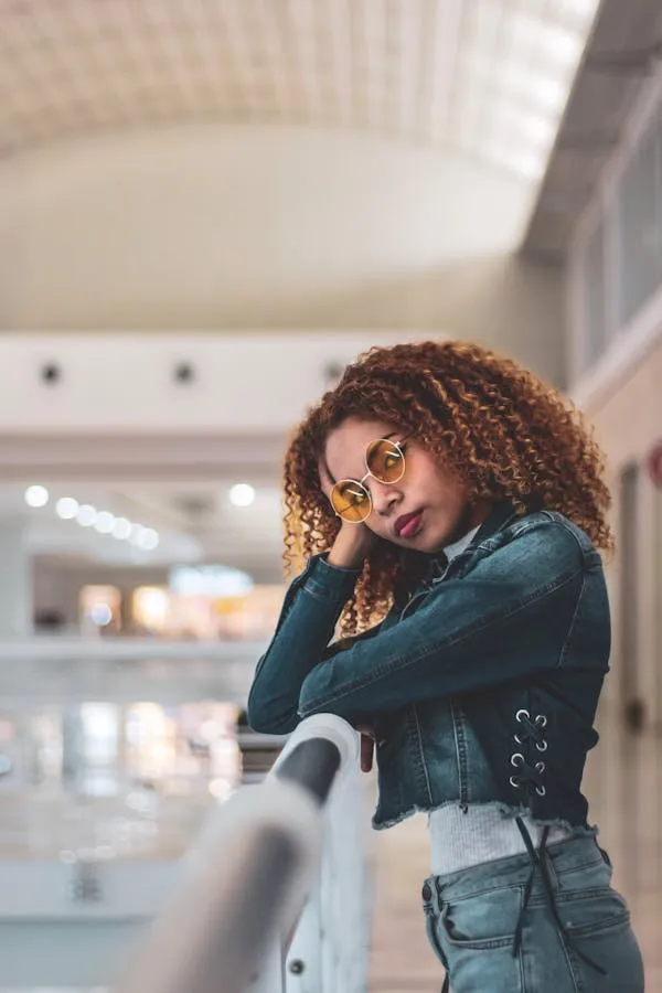 Confident Curly Haired Woman Posing At an Urban Location