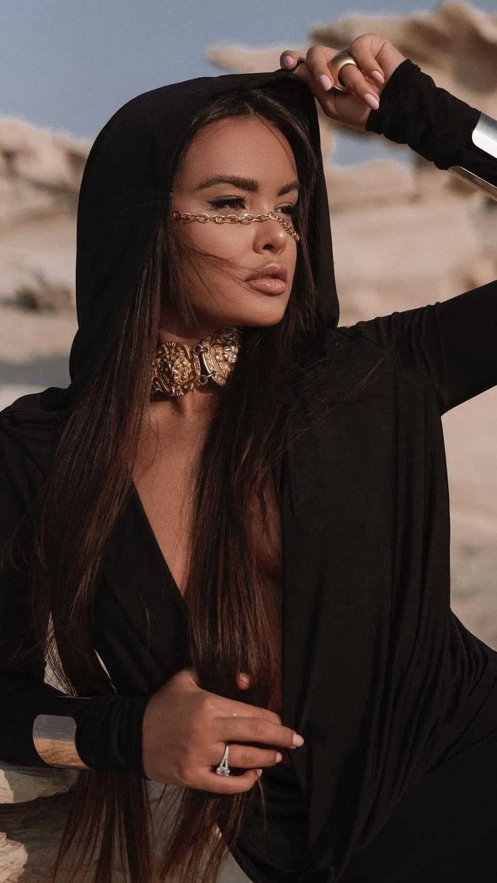 Confident Woman in Deep V Neck Top Posing At Sunset Hd Image