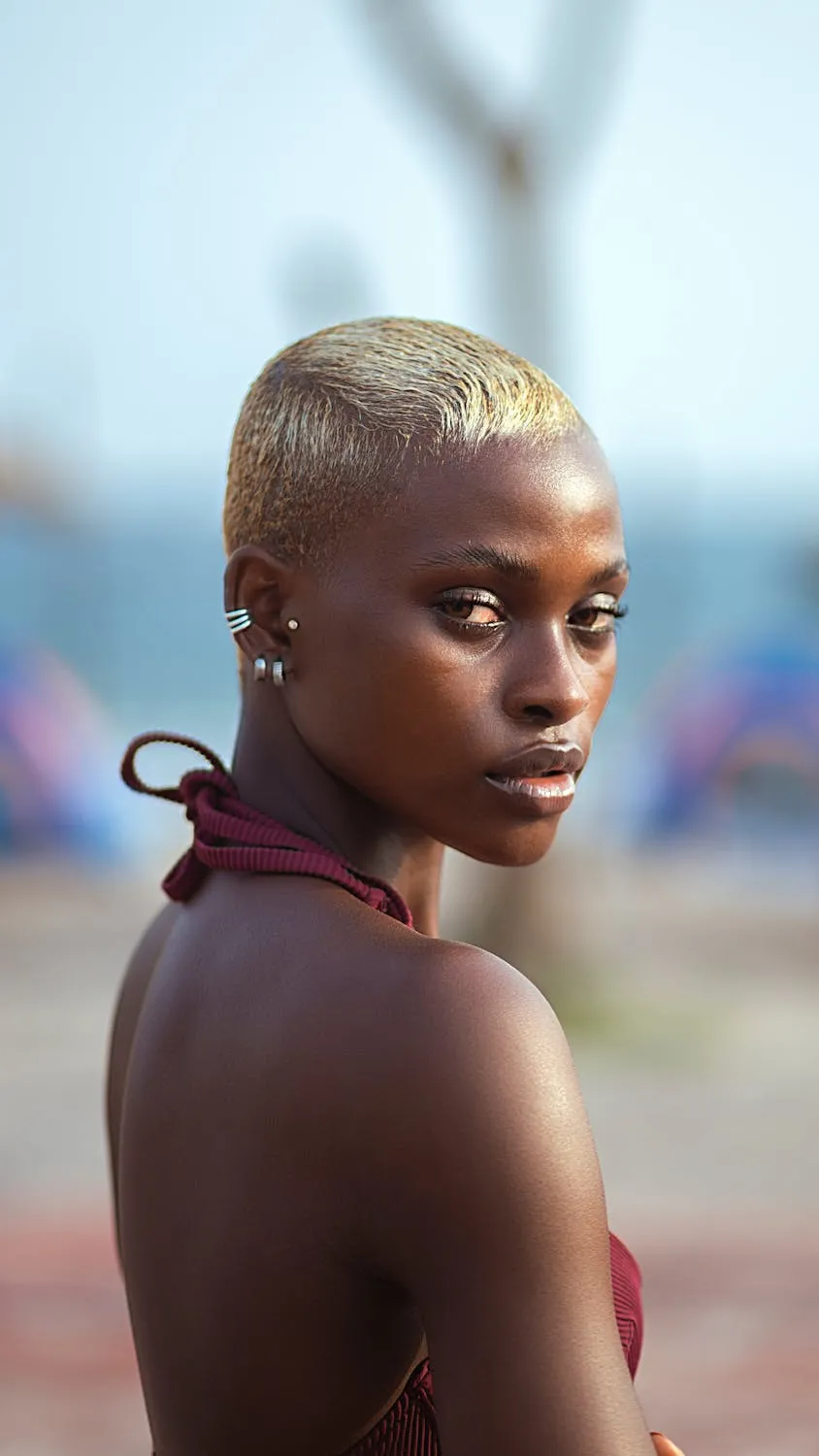 Confident Woman with Short Blonde Hair Looking Over Shoulder