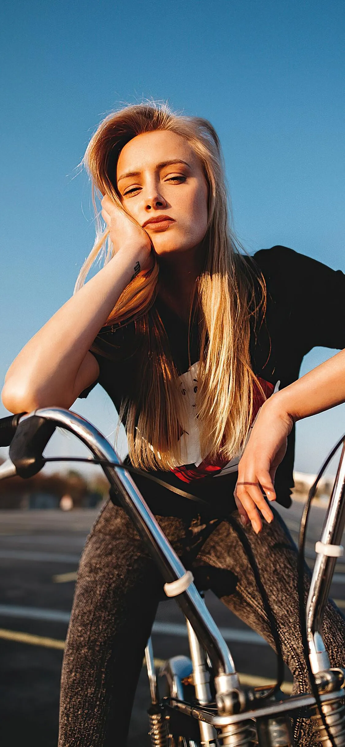 Confident Woman Standing in Front of a Car and Pink Smoke