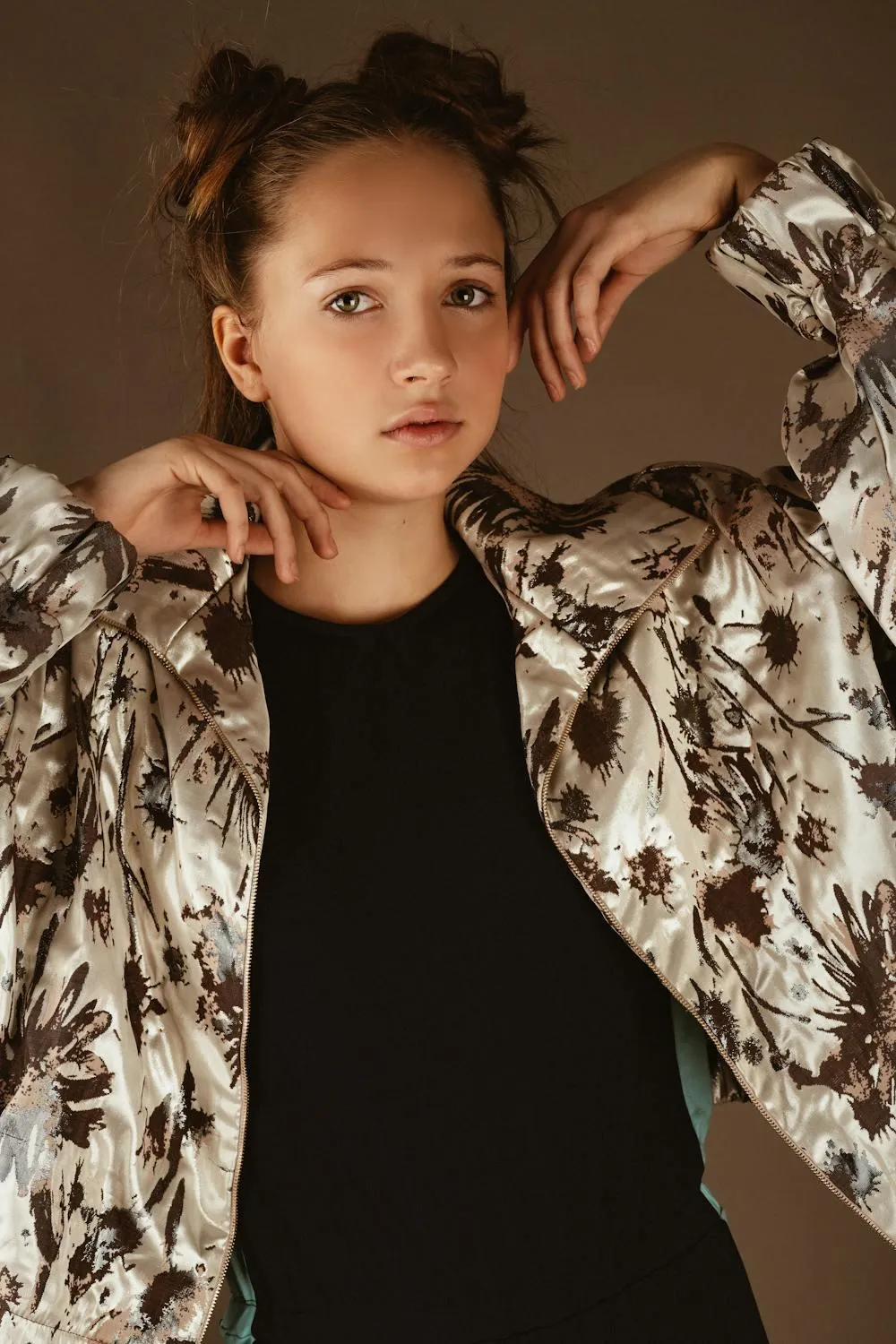 Confident Young Woman Wearing Patterned Jacket and Black Top