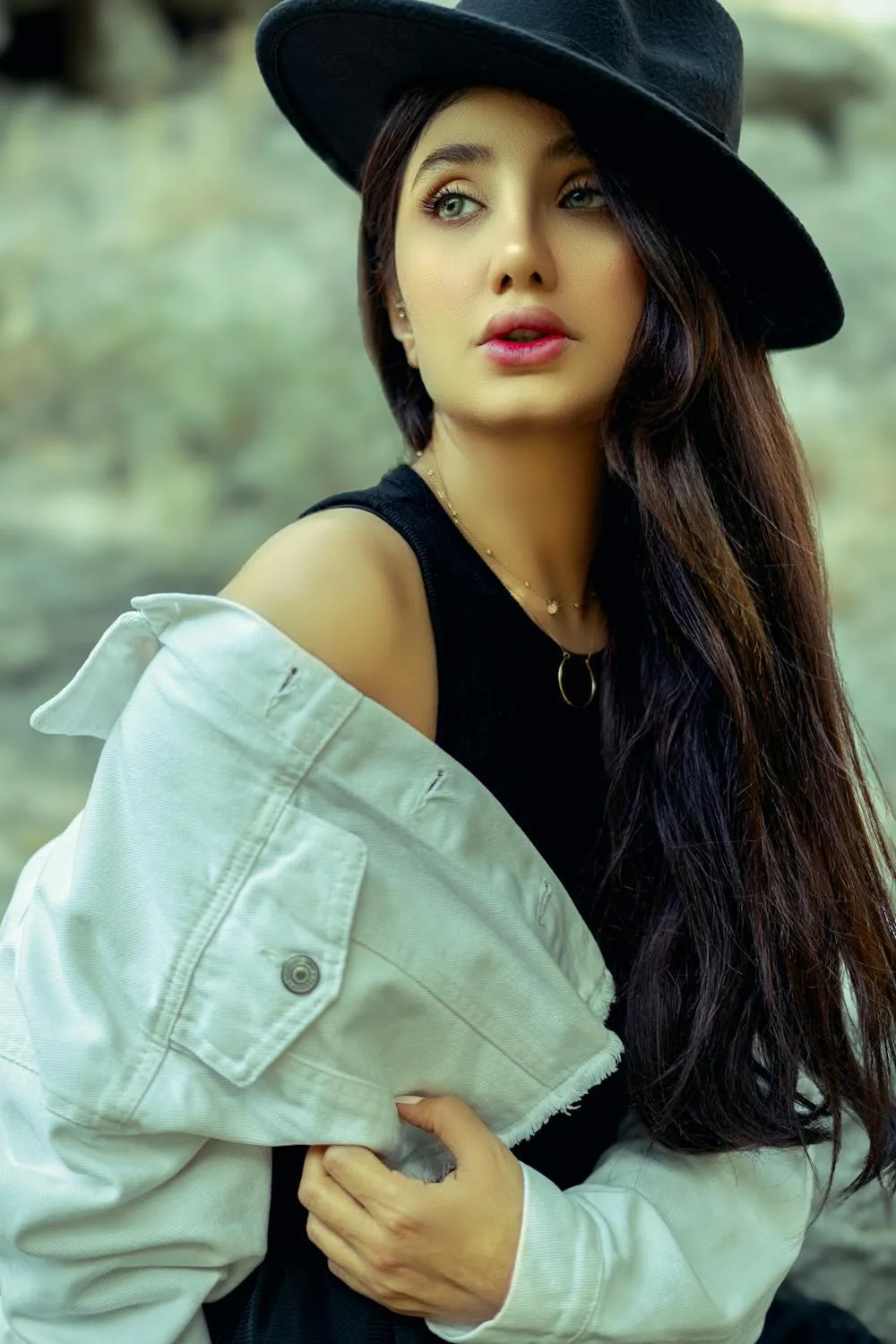 Cute Woman Wearing a Hat and Jacket with a Cute Expression