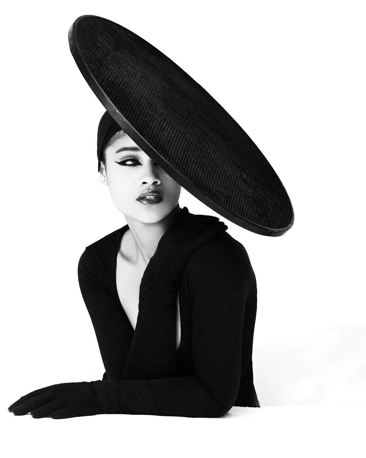 Fashion Model in Black and White with a Bold Hat Style Image