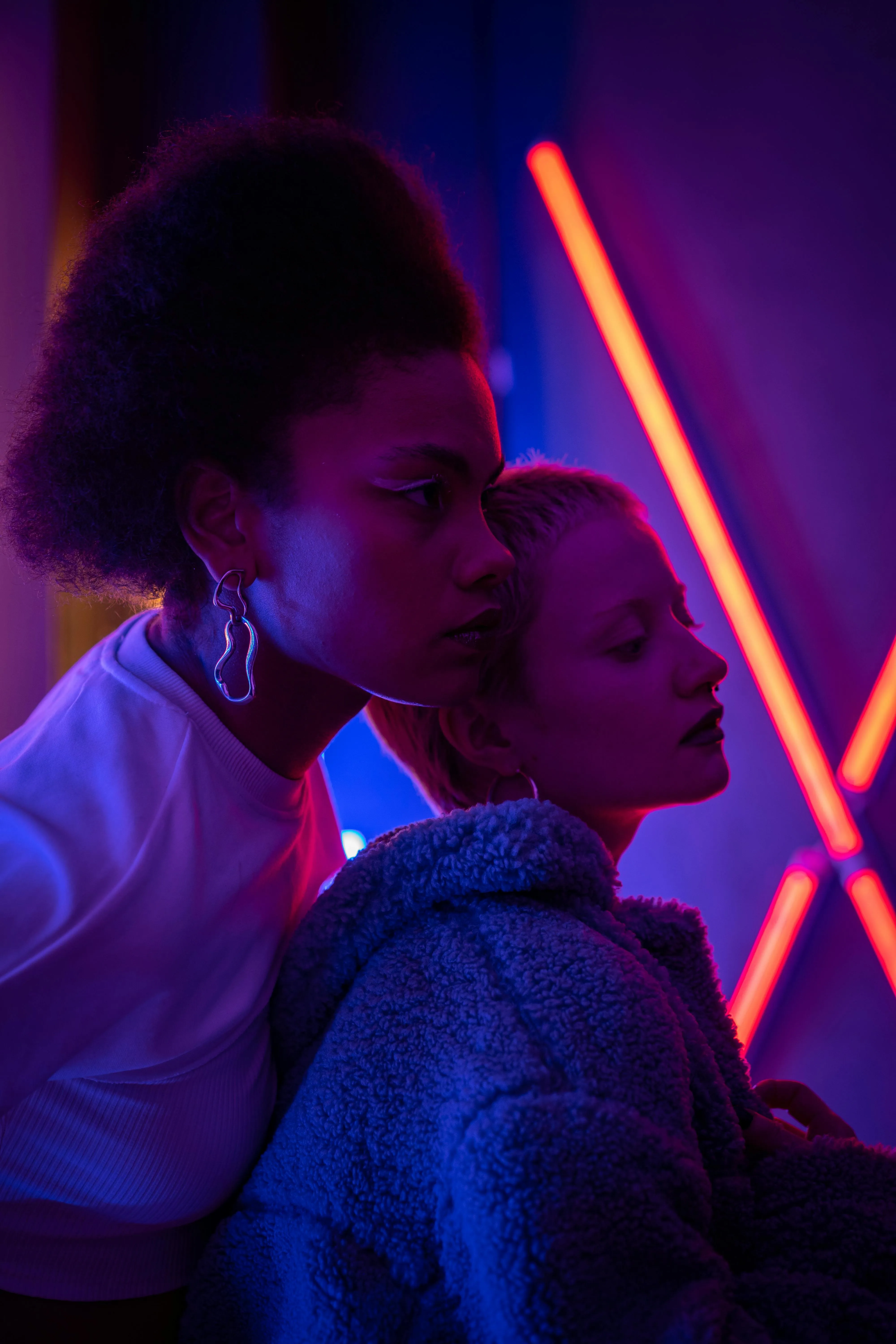 Friends in a Neon Light Nightclub Are Having Fun At a Party