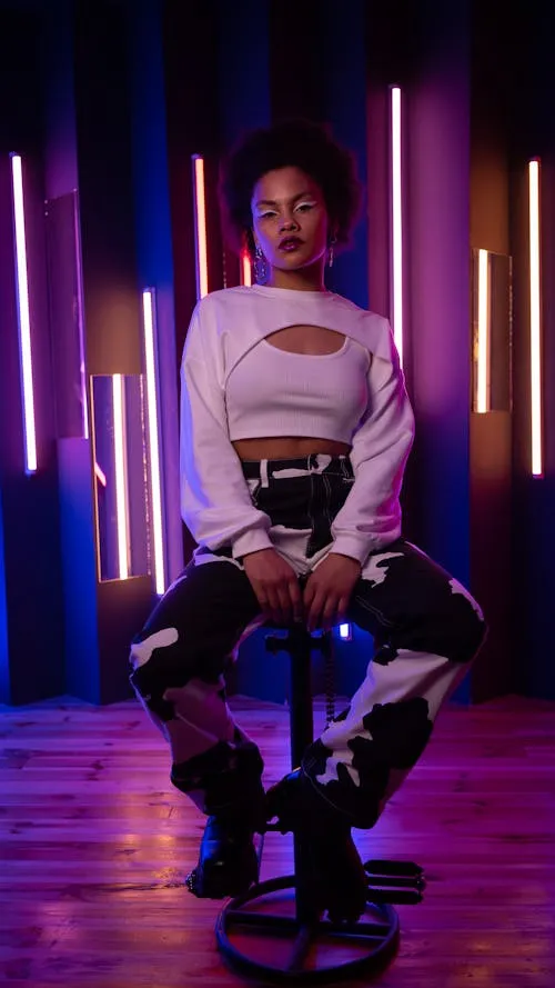 Futuristic Styled Woman Posing with Tech Lighting Wallpaper