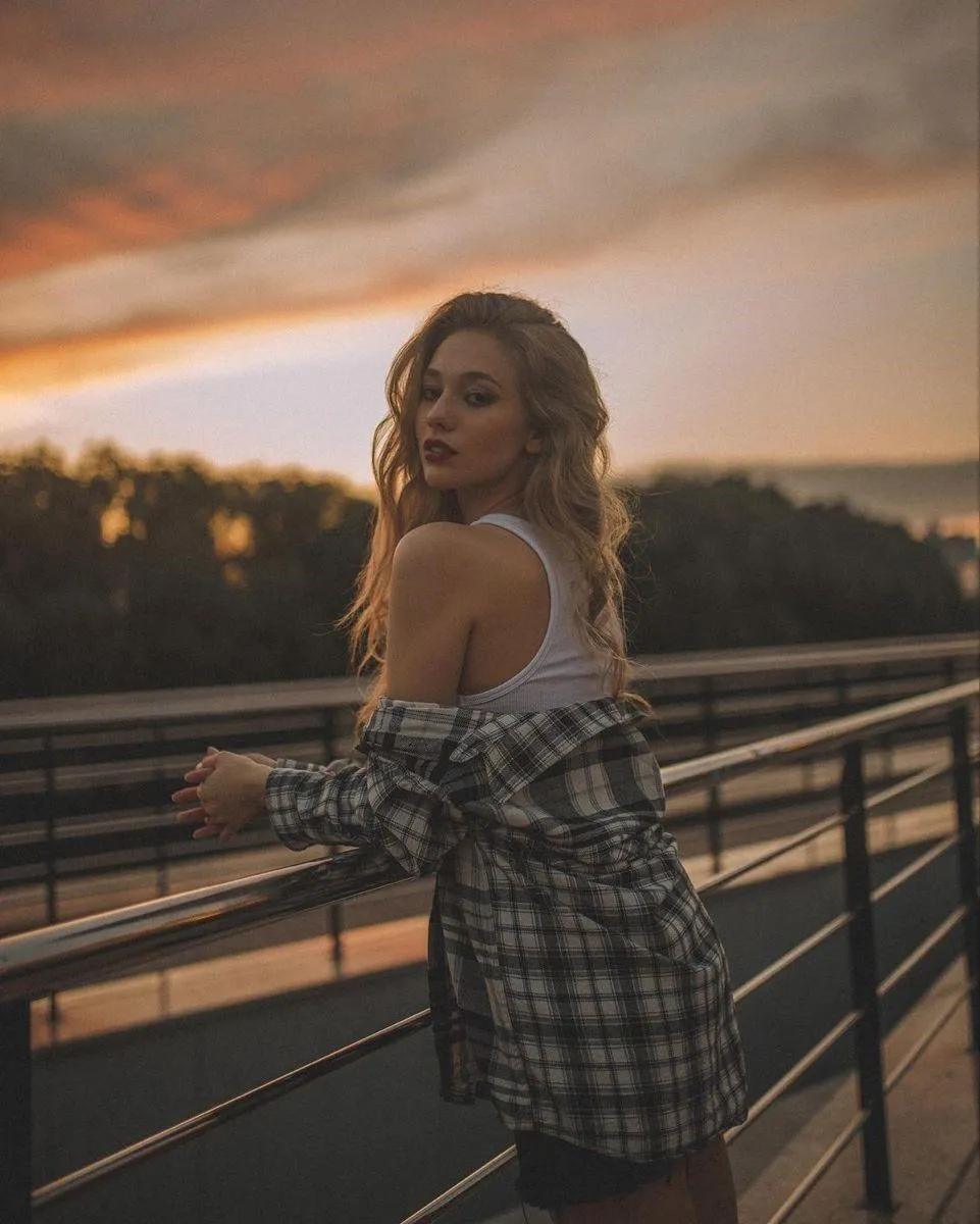 Girl Riding a Cruiser Bike in Front of a Blue Building