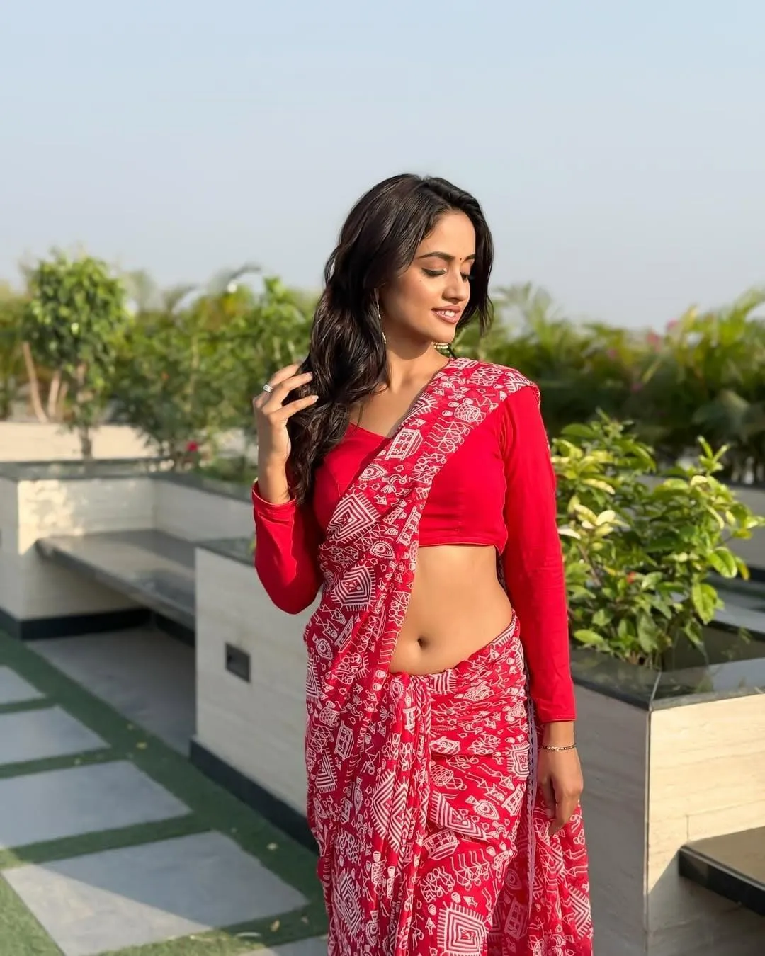 Gorgeous Nisha Guragain Stunning Brightly in Red Saree