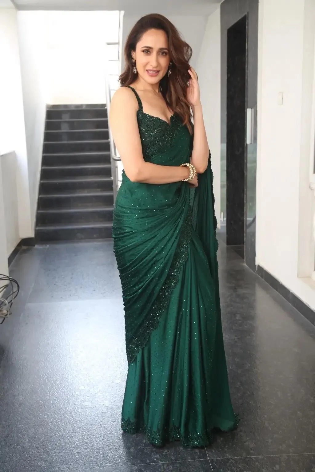 Gorgeous Pragya Jaiswal in Dark Green Saree Look Wallpaper