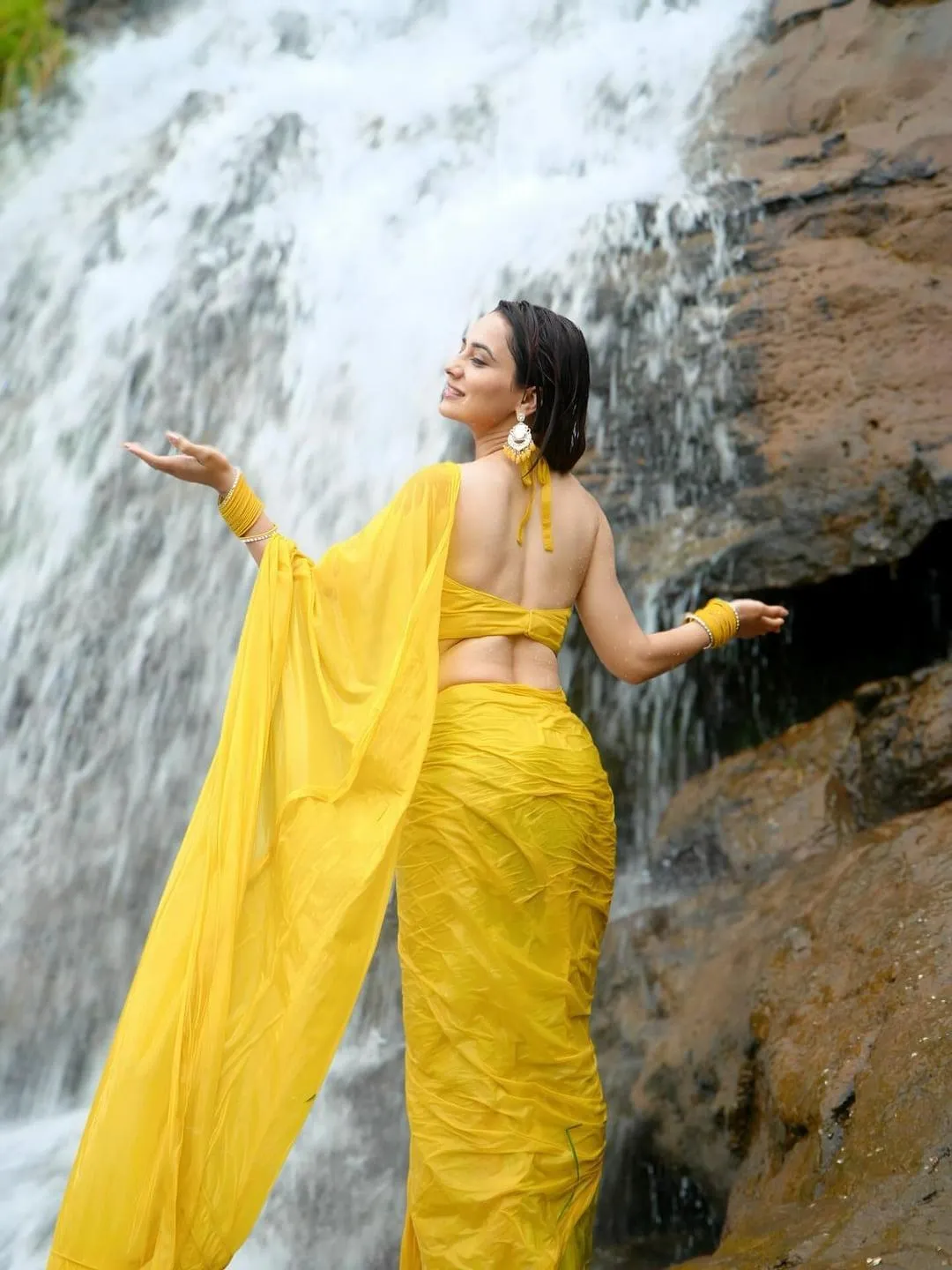 Gorgeous Priyanka Rewri in Yellow Saree by Waterfall Picture