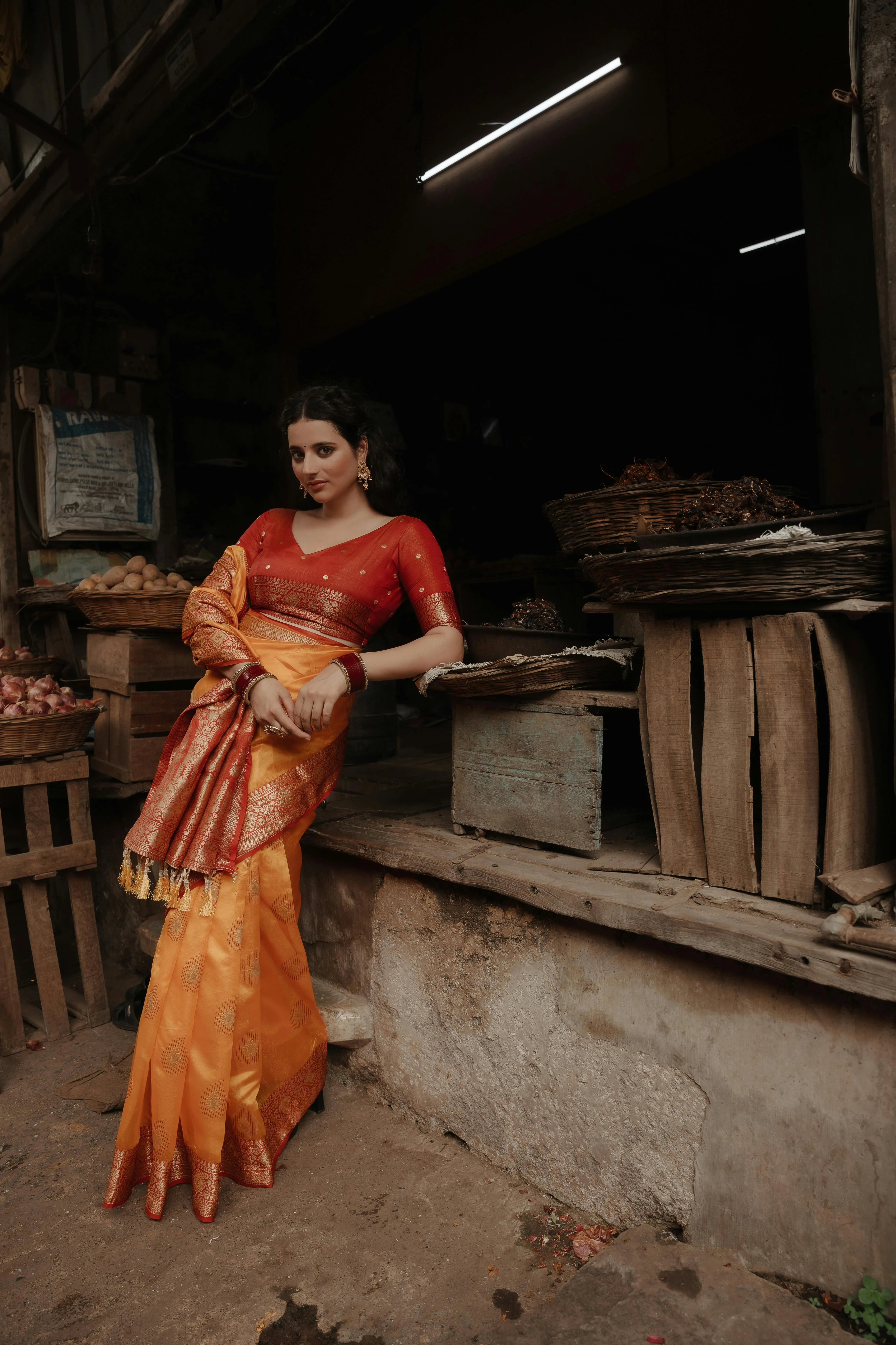 Gorgeous Young Woman in Orange Saree Rustic Outdoor Pose