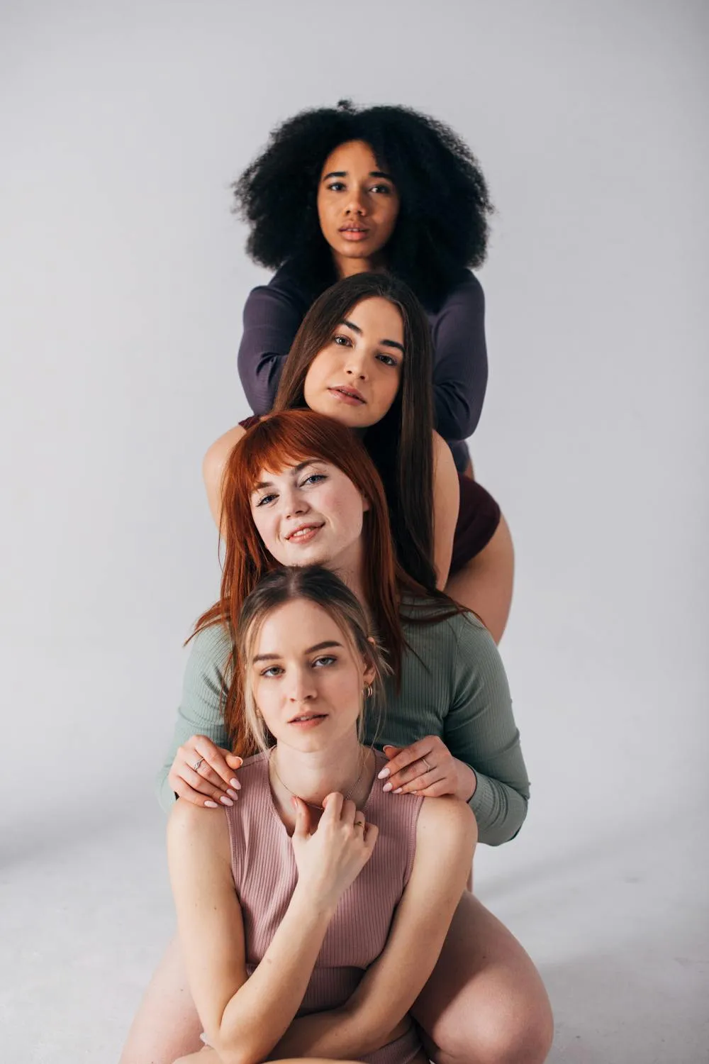 Group of Diverse Women Stacked in a Creative Portrait Pose