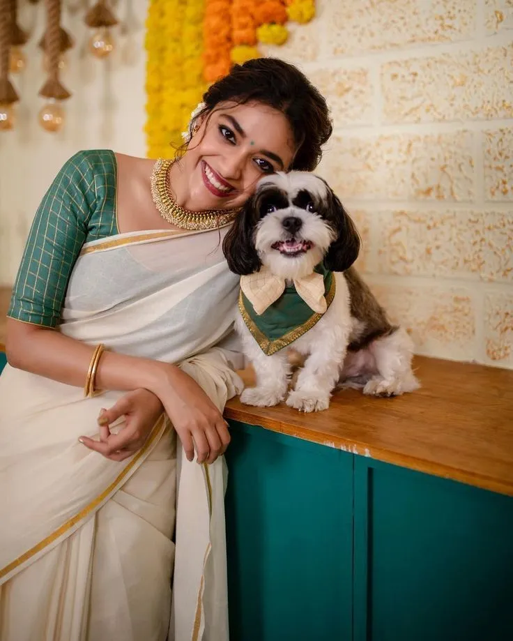 Keerthy Suresh and her dog Nyke celebrating Onam function