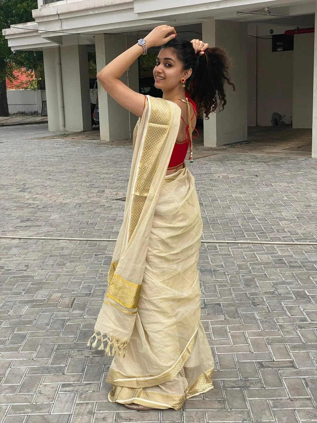 Keerthy Suresh in Golden Saree Posing with Confidence Image