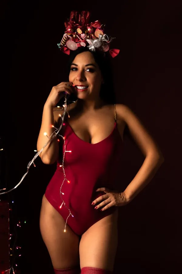 Model Wearing a Red Bodysuit with a Floral Crown Posing