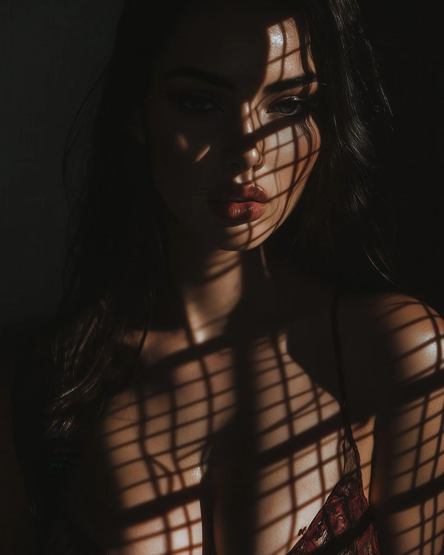 Moody Portrait of a Woman with Light and Shadow Patterns