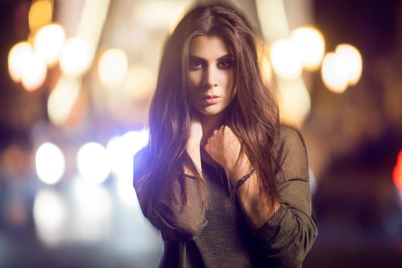 Portrait of a Confident Woman with Long Flowing Black Hair