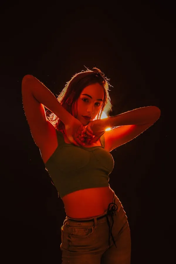 Portrait of Woman Model in Silhouette with Orange Lighting