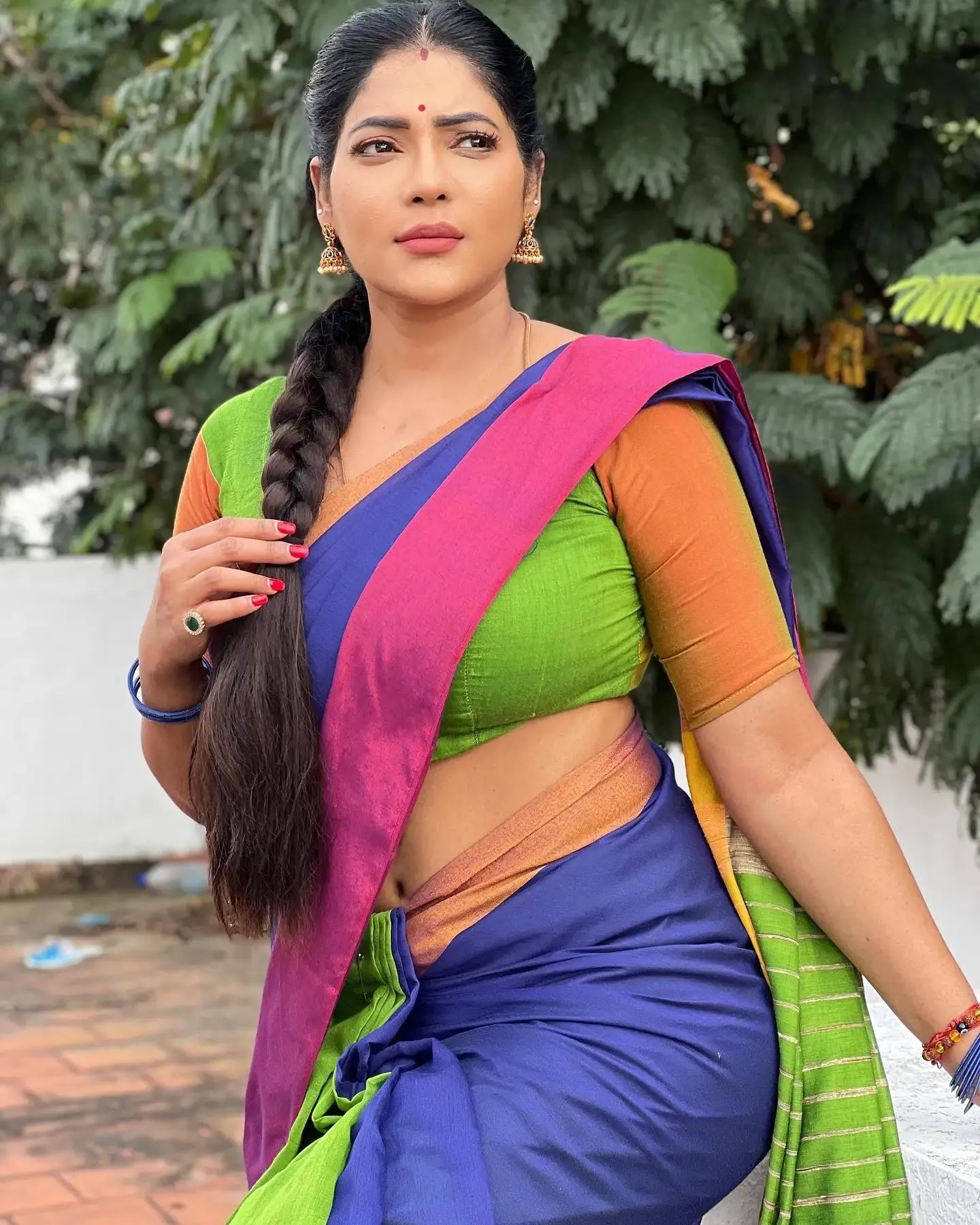 Reshma Pasupuleti in Purple Saree Posing Outdoors Calm