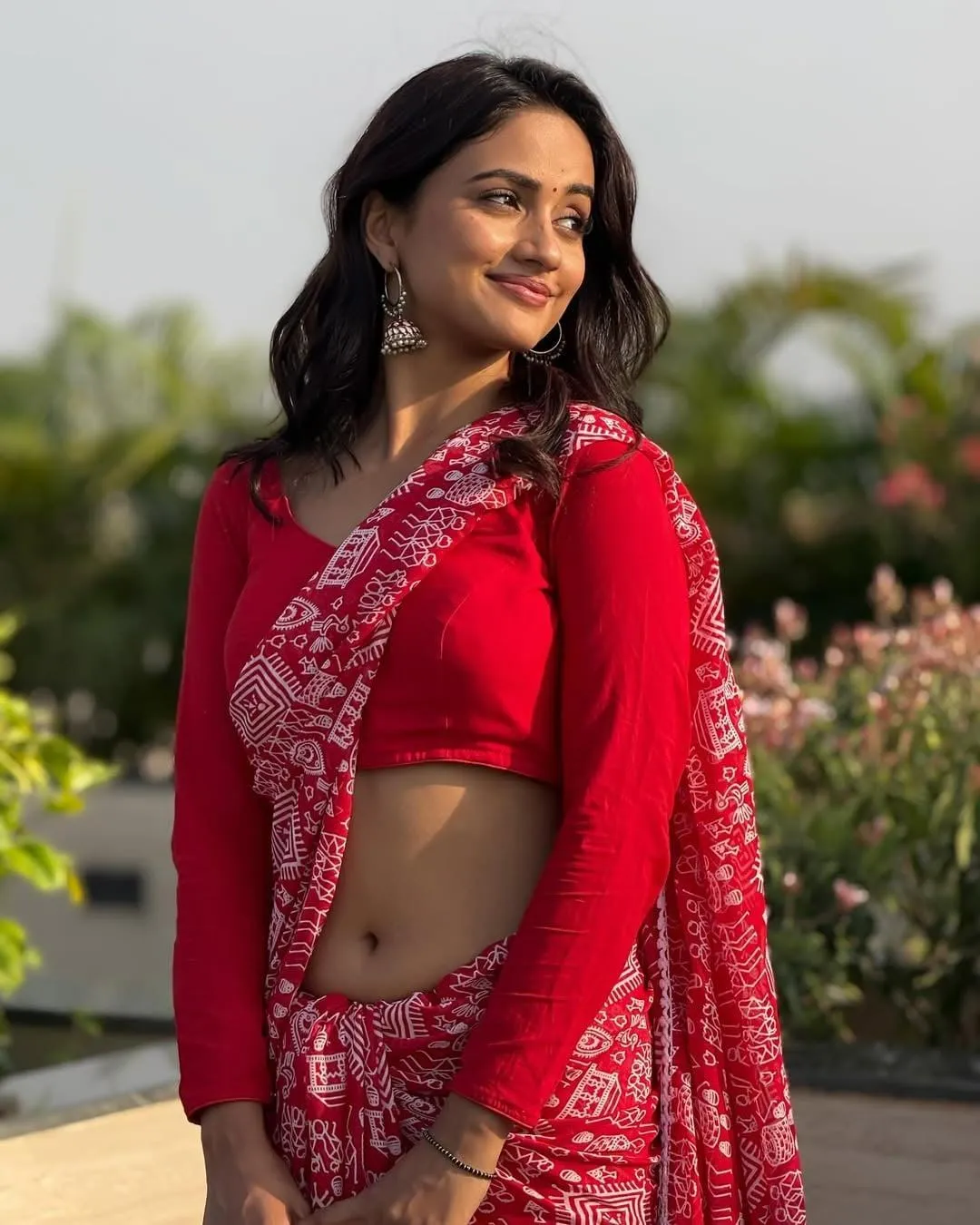 Sensual Nisha Guragain in Red Saree Creating Classic Glow