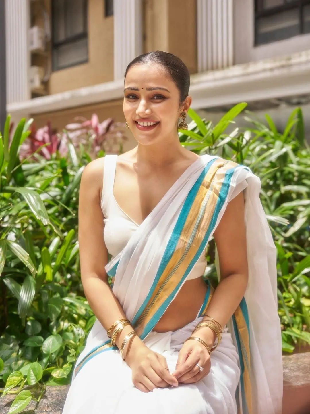Stunning Anaira Gupta Shining Softly in White and Blue Saree