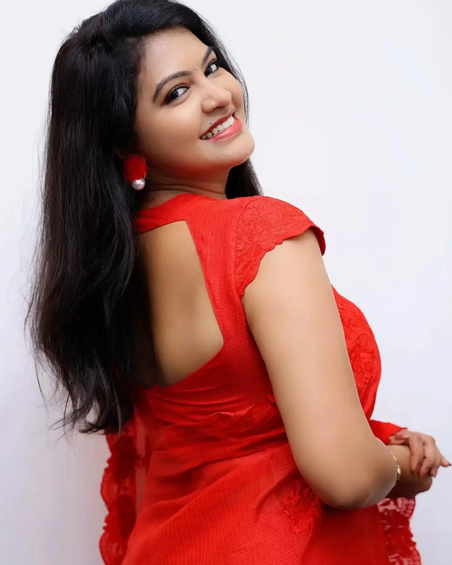 Stunning Rachitha Mahalakshmi in Red Saree with Elegant
