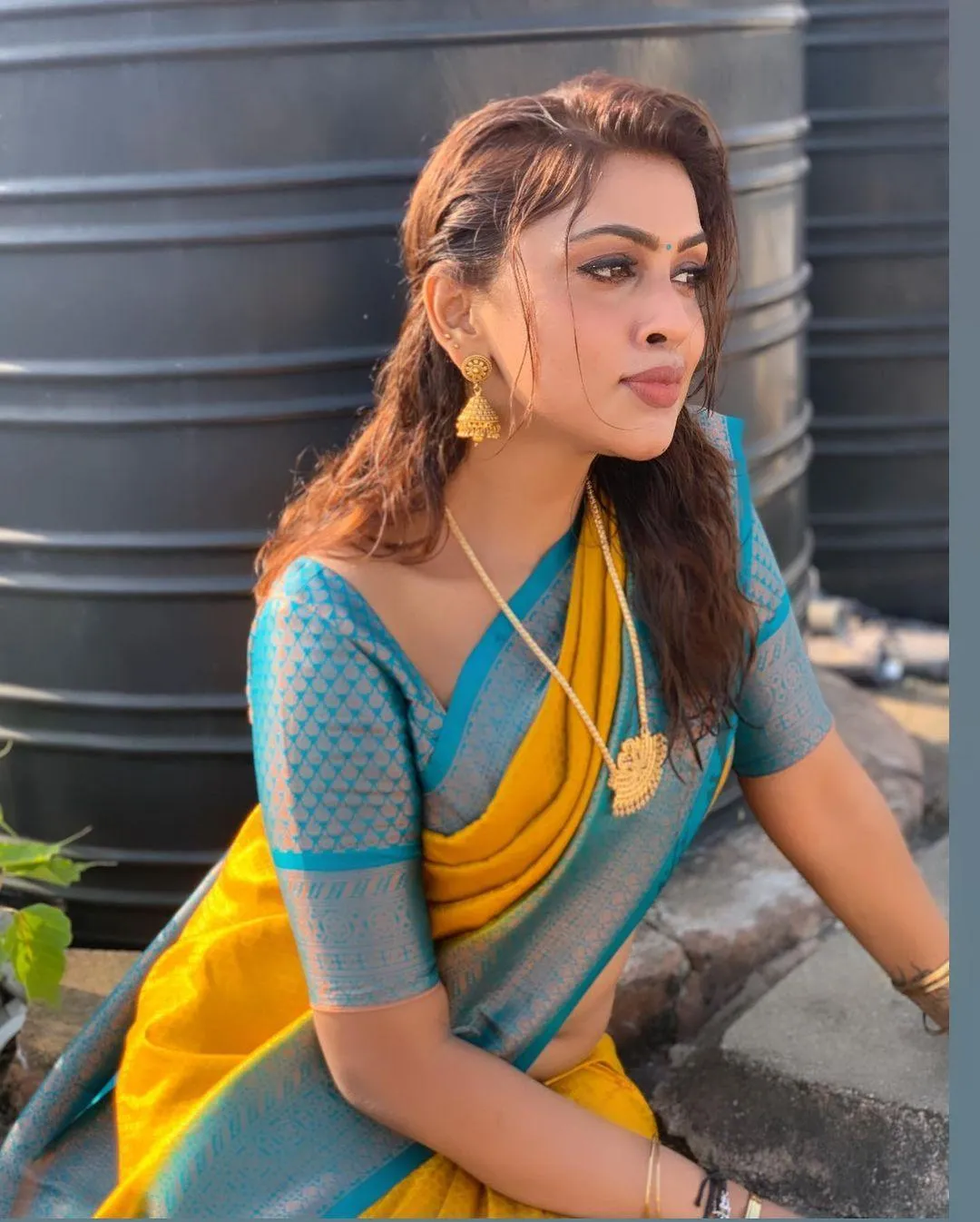 Stunning Sri Nikha in Blue Yellow Saree Blending Elegance