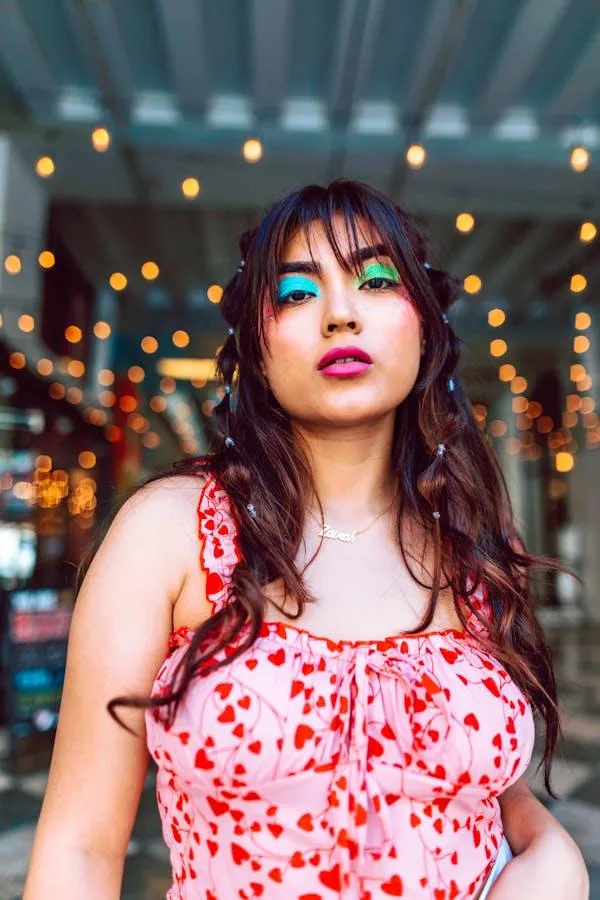 Stylish Girl with Colorful Lights Wearing a Pink Outfit