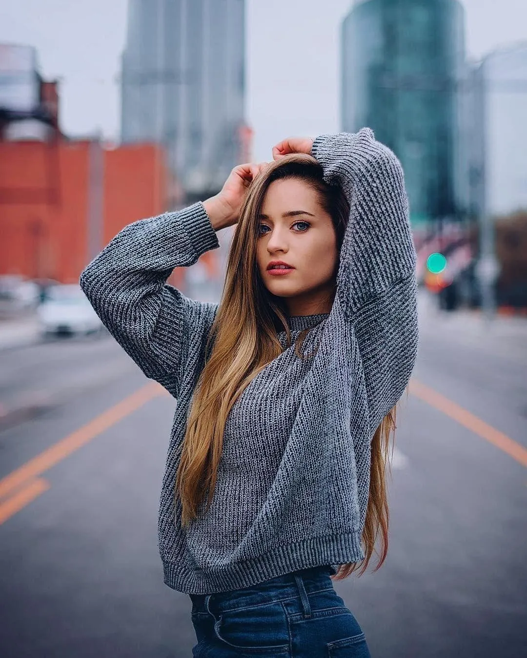 Stylish Woman Posing Confidently on an Urban City Street