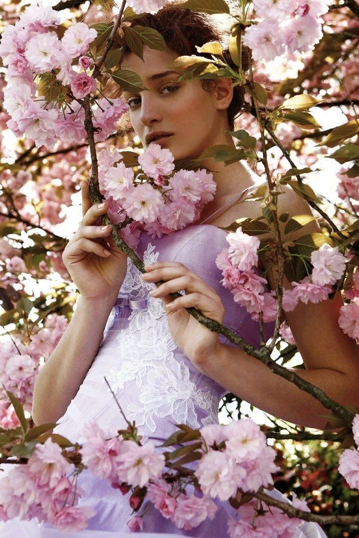 Stylish Woman in a Sunglasses with Dramatic Evening Light