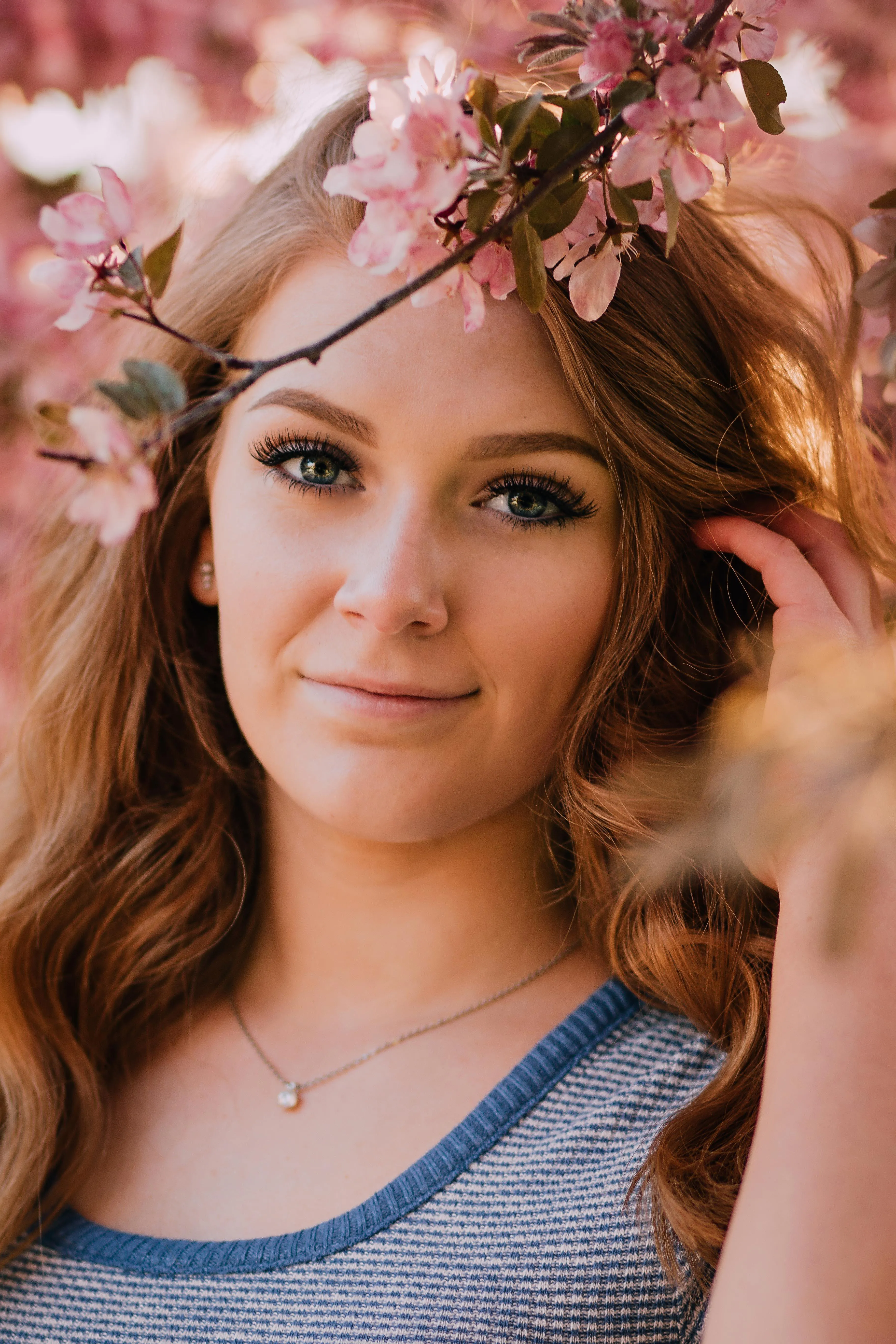 Stylish Woman with Sunglasses Sitting in an Outdoor Cafe