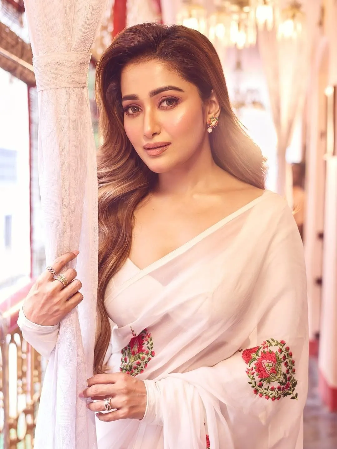 Sultry Sudipa Banerjee in White Saree Portraying Grace