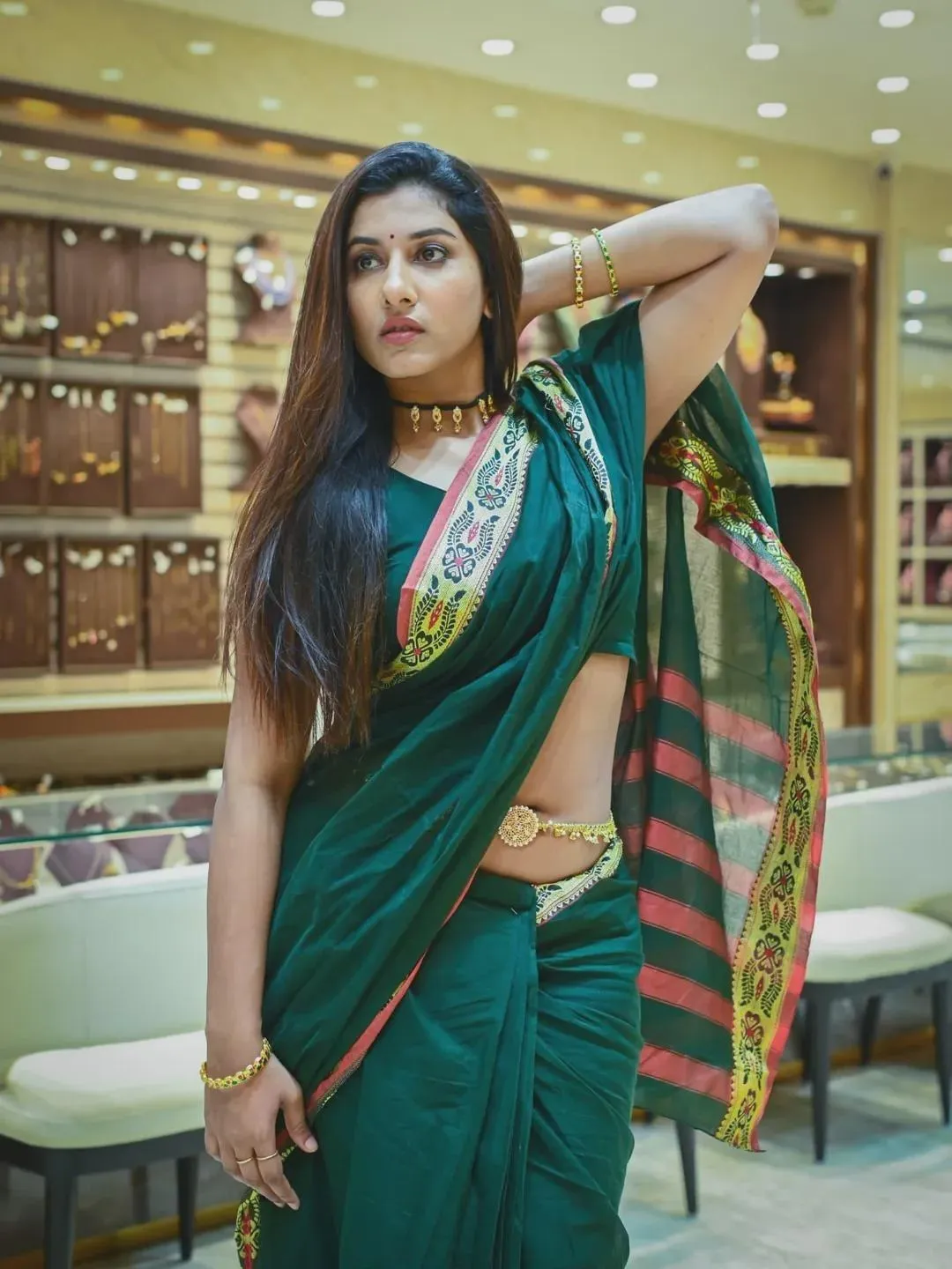Sultry Vishnu Priya Bhimeneni in Green Saree with Charm