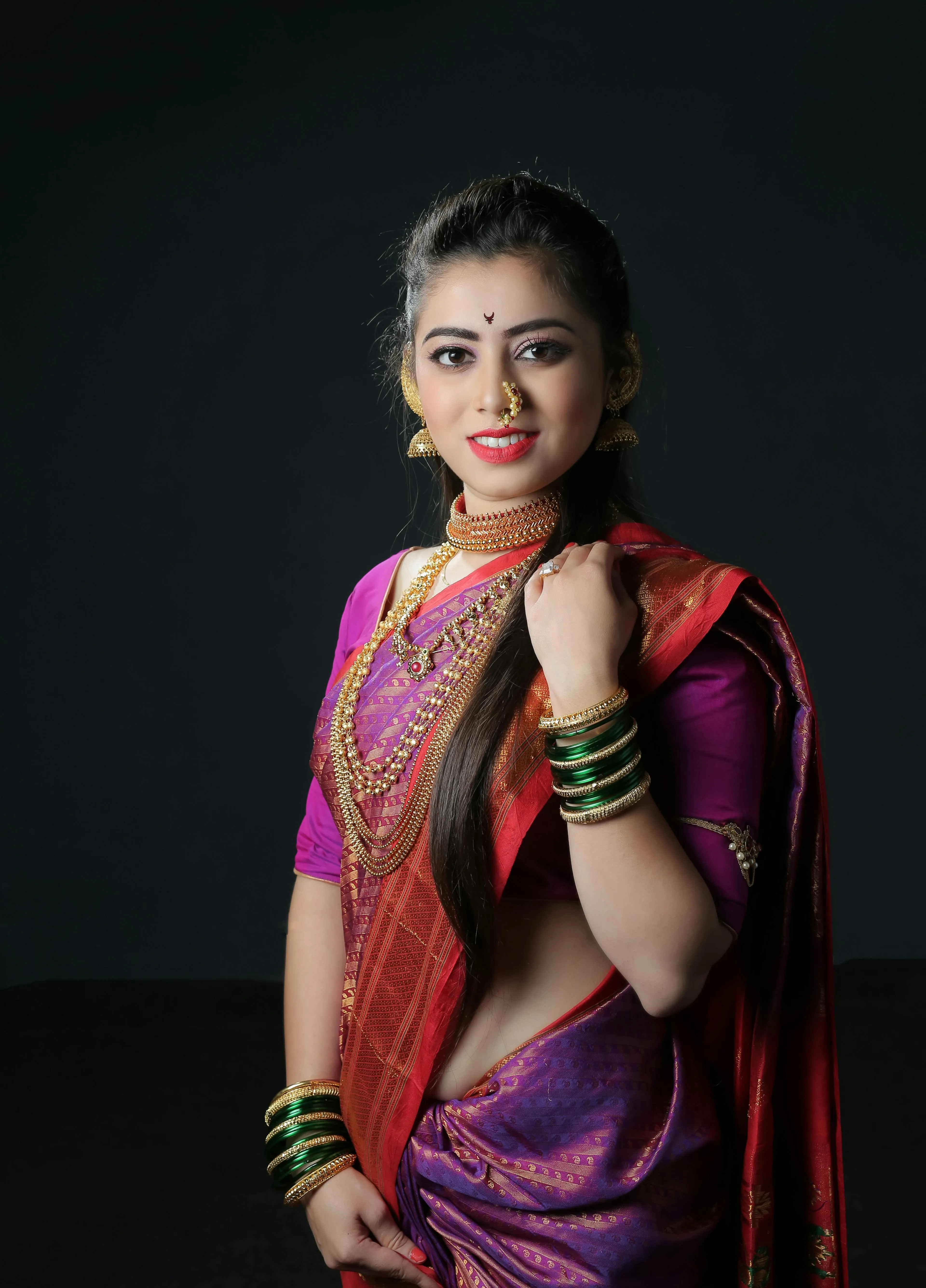 Sultry Young Woman in Purple Saree Indoor Classic Pose Image