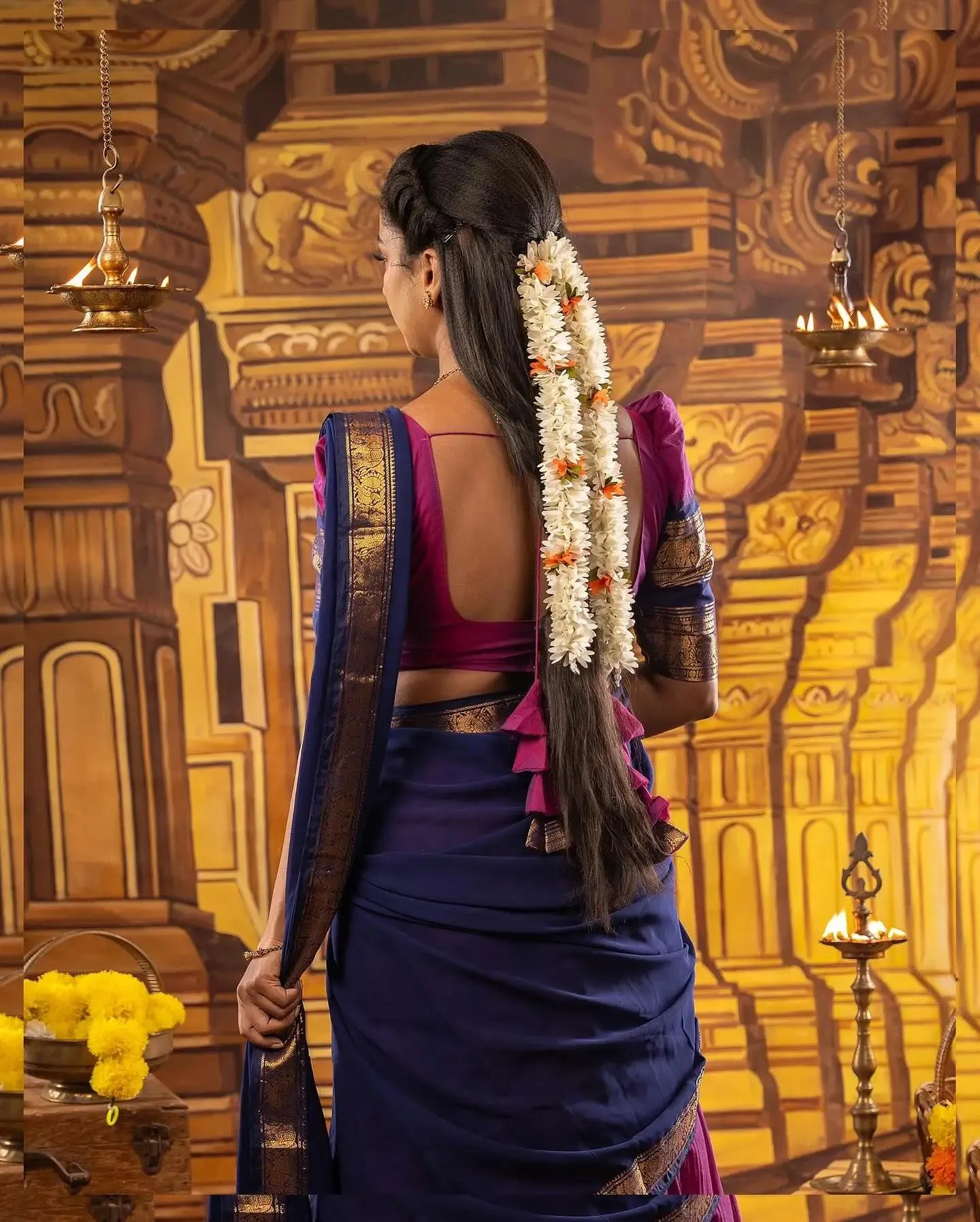 Swathi Konde in Blue Saree Posing with Cultural Charm Image