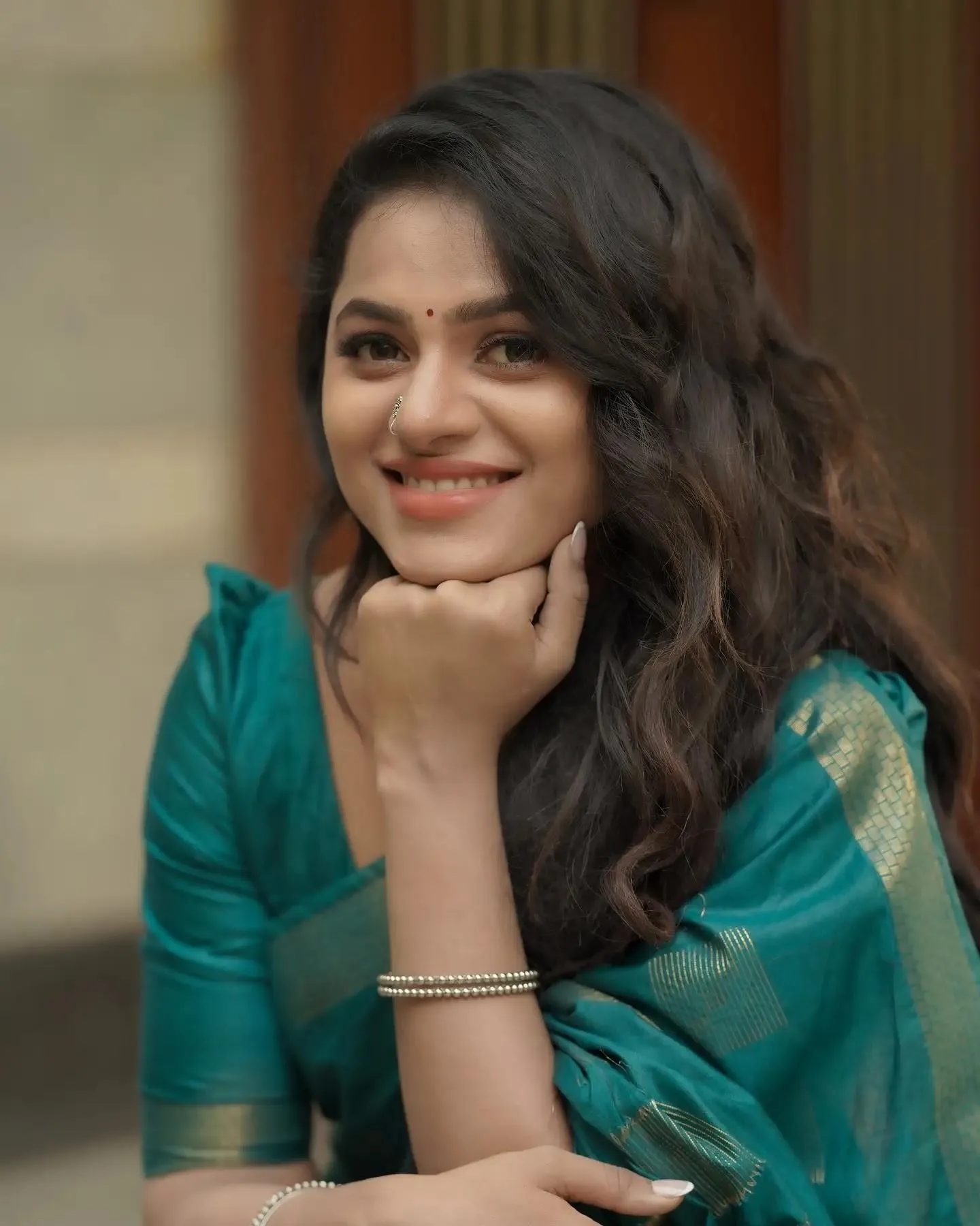 Tempting Delna Davis in Teal Saree with Elegant Beauty