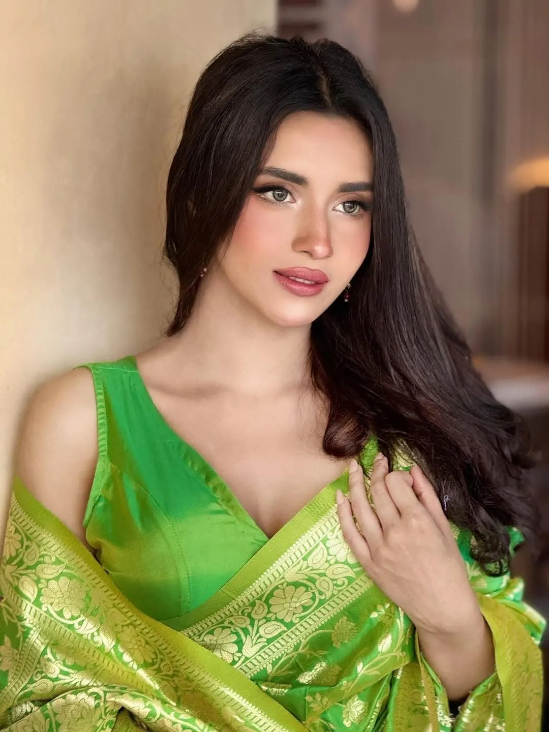 Tempting Saanzida Putul Radiating Charm in Green Saree