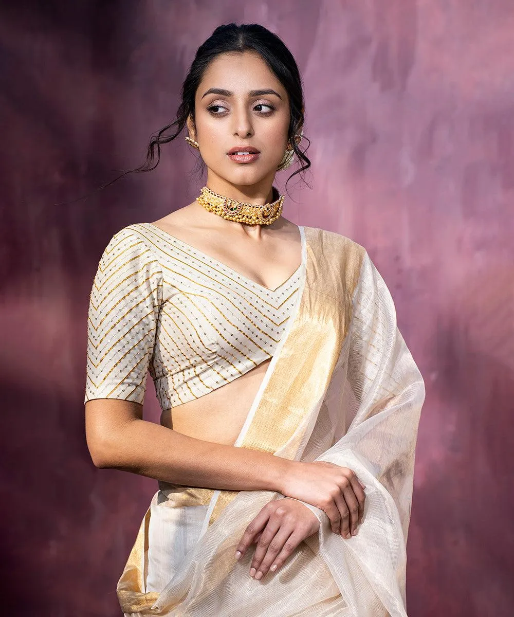 Tempting Woman in Cream Saree Radiating Royal Elegance