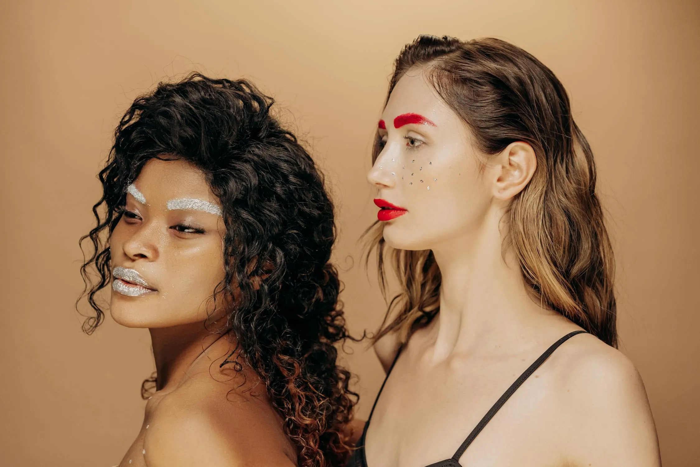 Two Diverse Women Posing in a Bold Editorial Portrait Image