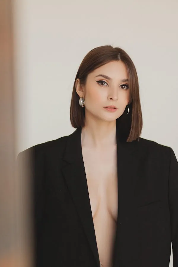 Woman in Black Blazer with a Confident Serious Expression
