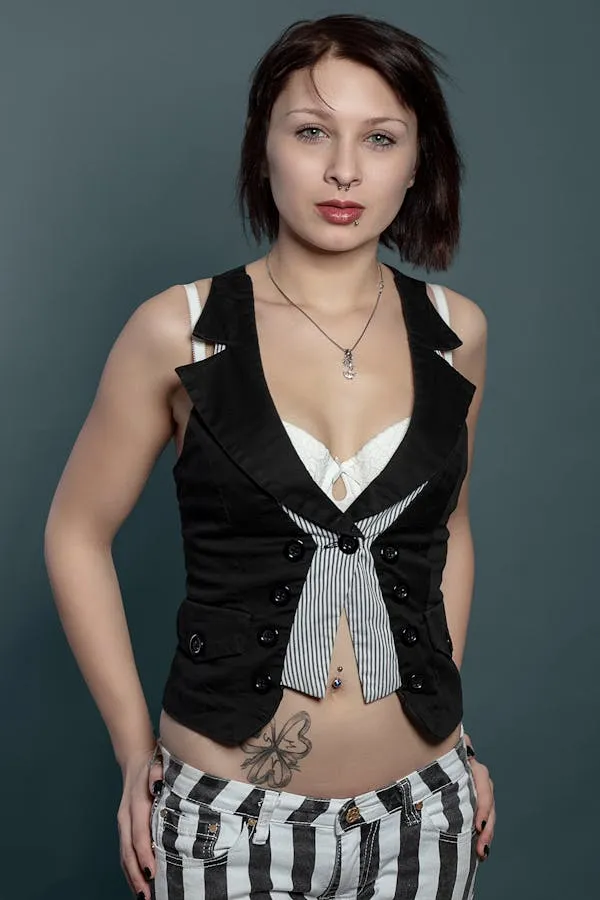 Woman in a Black and White Top with a Confident Look Image