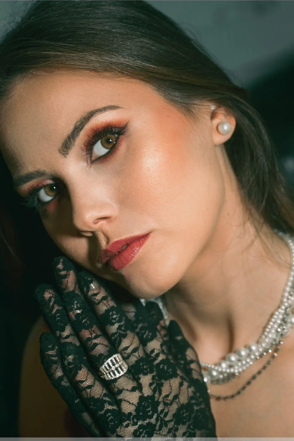 Woman with Bold Eye Makeup Gazing Intensely At the Camera