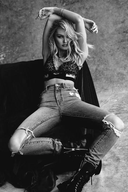 Woman in a Gray Crop Top Posing Near a Modern House Image