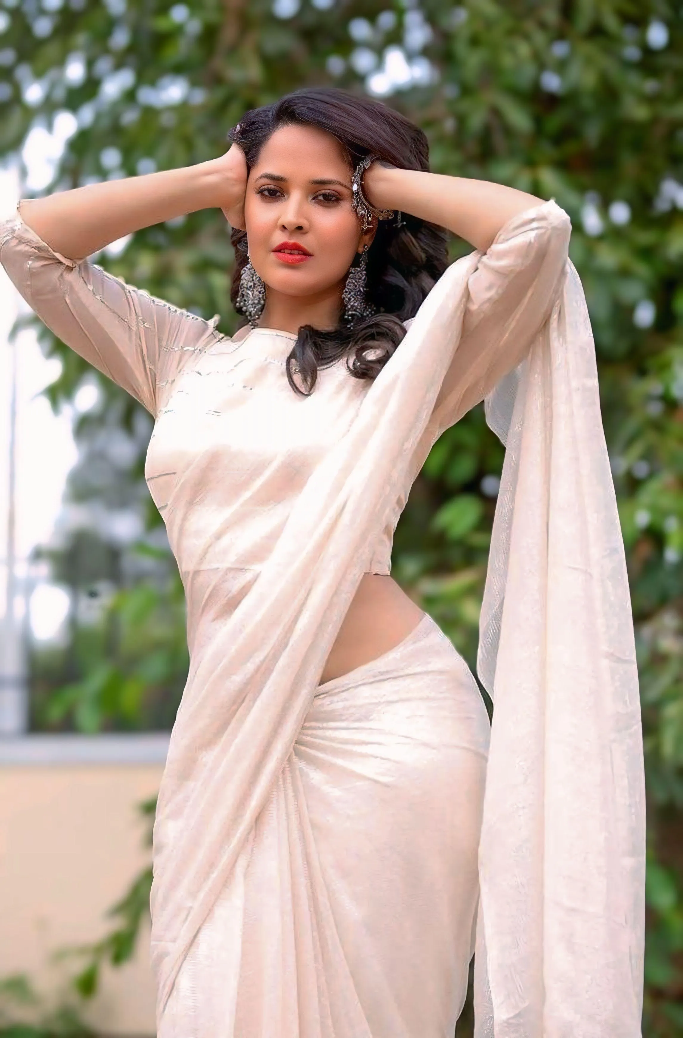 Woman in Light Pink Saree Posing Outdoors Arms Open Picture